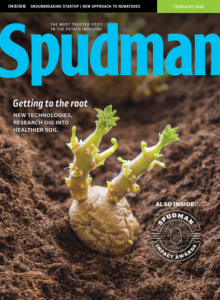 The February cover of Spudman magazine show a green potato sprout peeking through the soil