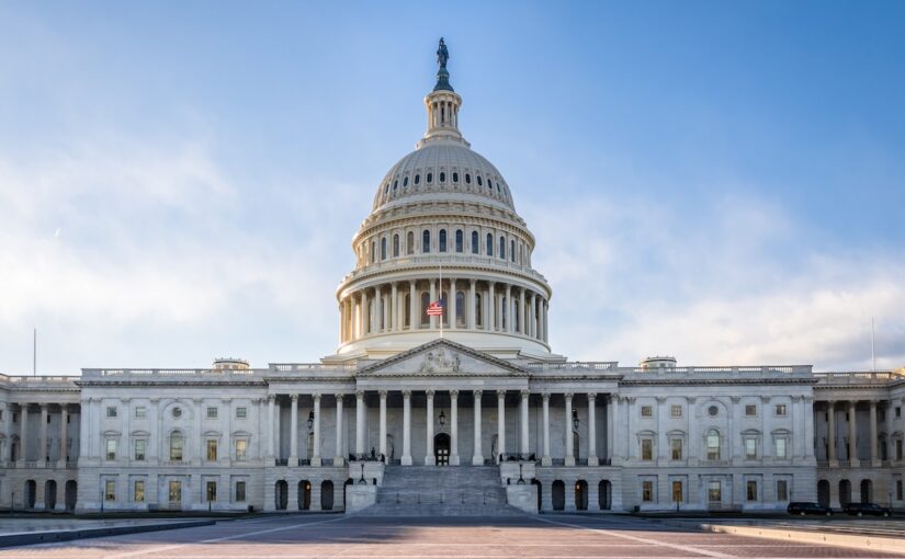 The U.S. Capitol framed against a blue sky
