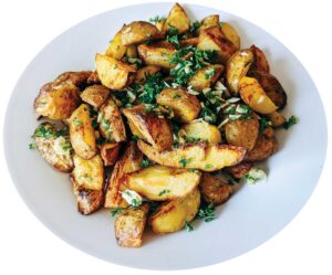 Potato wedges arranged on a plate