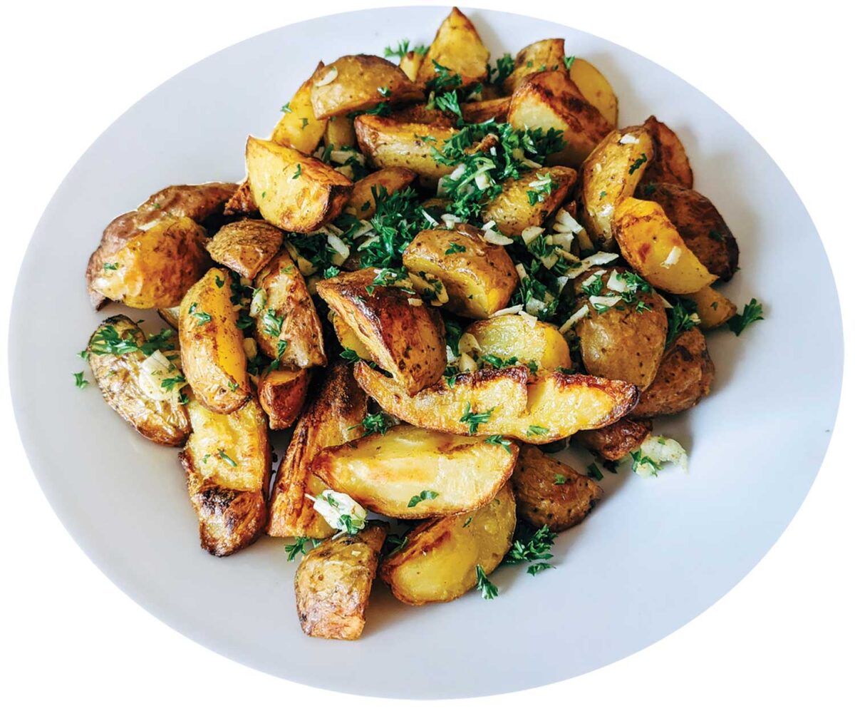 Potato wedges arranged on a plate
