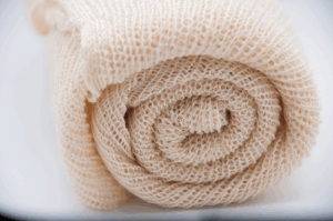 A roll of fiber made from potato plant roots and stems 