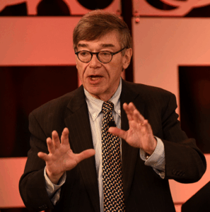 Headshot of a man in a suit