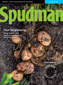 Magazine cover with freshly unearthed potatoes in soil